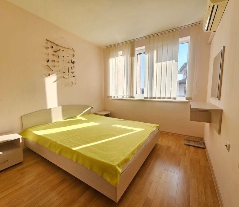 Elegant bedroom with sea views in Elenite Resort.