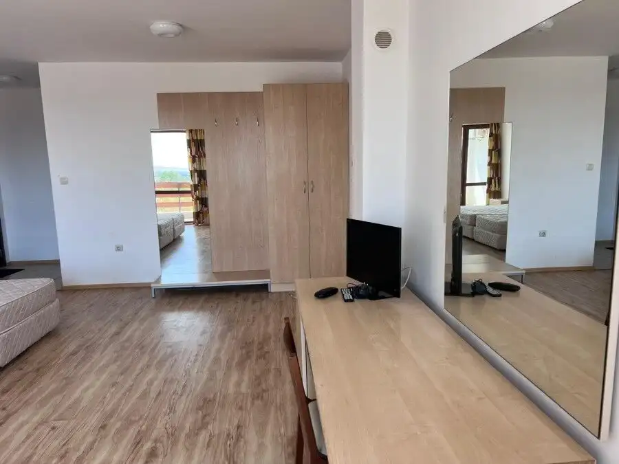 Bright studio with open layout and wooden flooring in Gardenia Hills, near Sunny Beach.