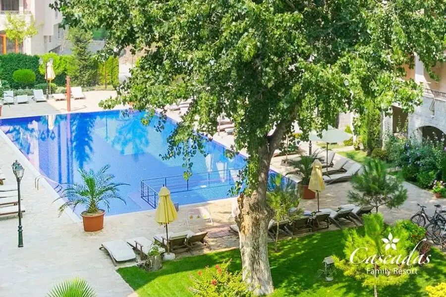 Pool view apartment with a balcony overlooking the swimming pool at Cascadas Family Resort, Sunny Be.