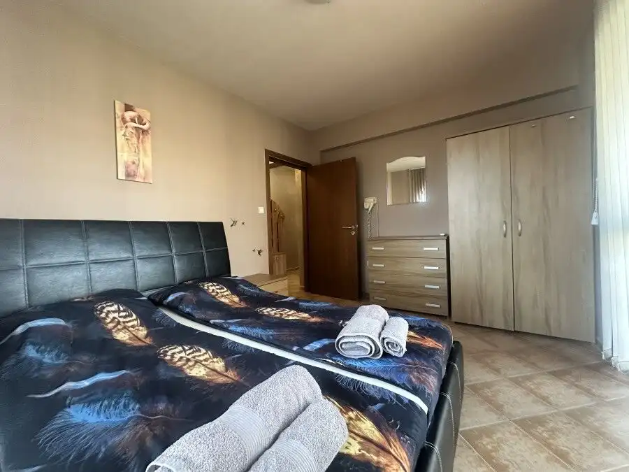 Apartment with pool view and modern furnishings in Sunny Beach.