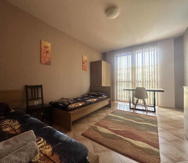 Interior of a 3-bedroom apartment with pool view in Cascadas Family Resort, Sunny Beach.