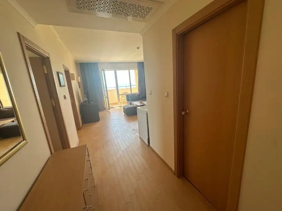 Sea view apartment in Sunny Beach with modern interior and balcony overlooking the ocean.