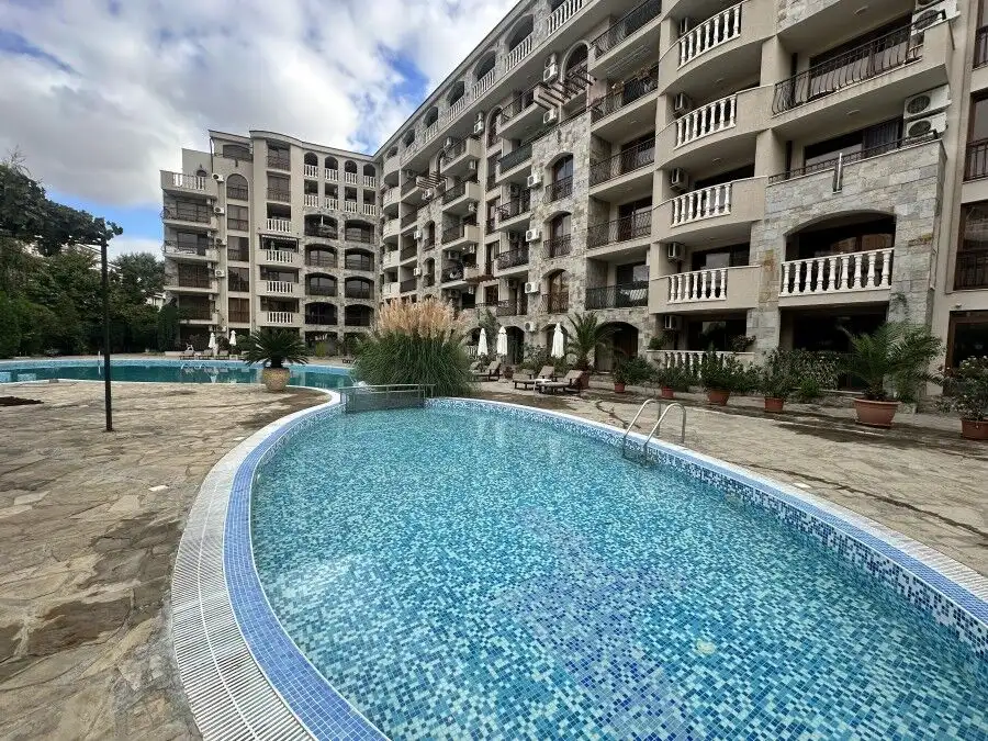 Modern apartment complex with pool in Sunny Beach, Bulgaria, near the sea.