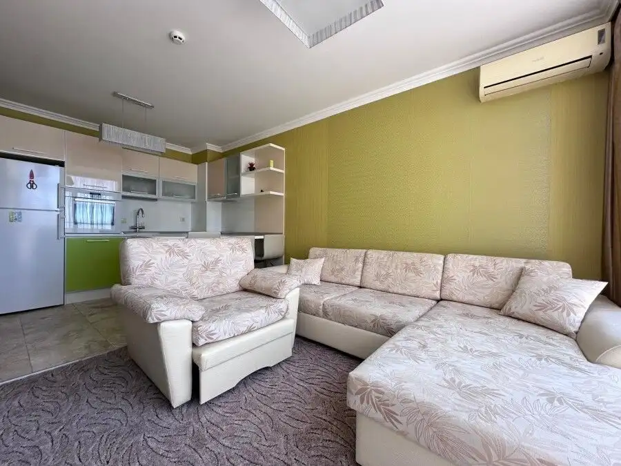 Bright living room with sofa and open kitchen in Dolce Vita 2, Sveti Vlas, 50 m from the sea.