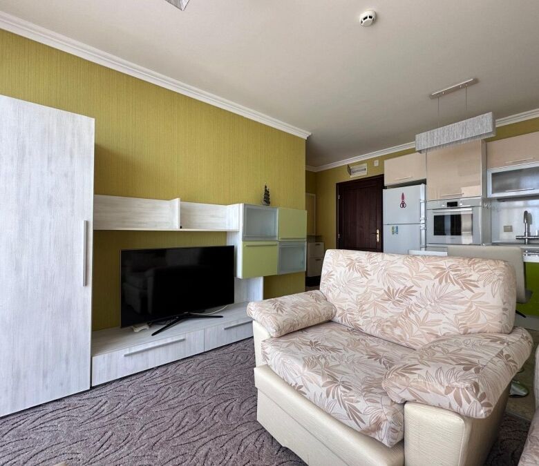 Cozy 1-bedroom apartment near the sea in Sveti Vlas, featuring a stylish living area and scenic sea.