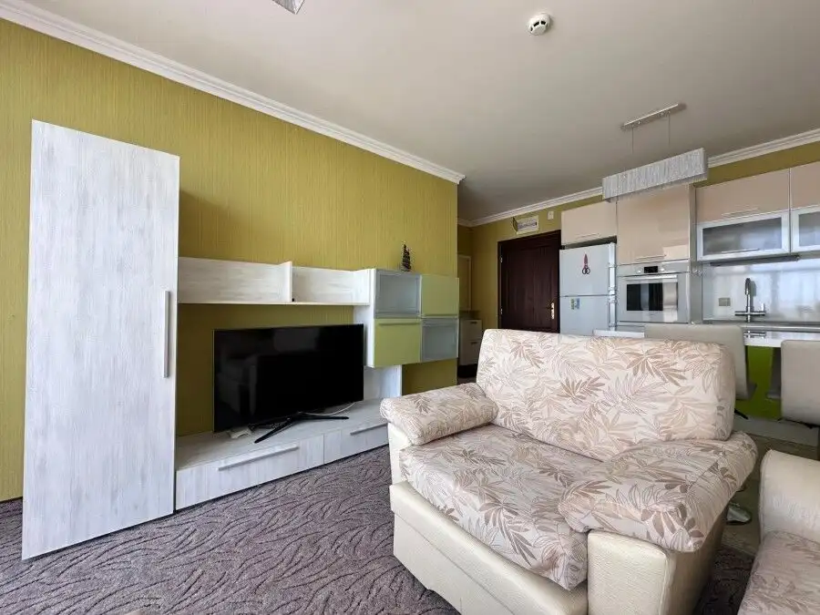 Cozy 1-bedroom apartment near the sea in Sveti Vlas, featuring a stylish living area and scenic sea.