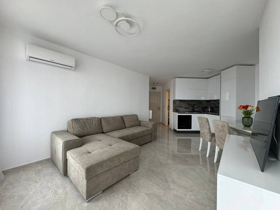 Bright living room in a 1-bedroom sea view apartment in Sveti Vlas, close to the beach.