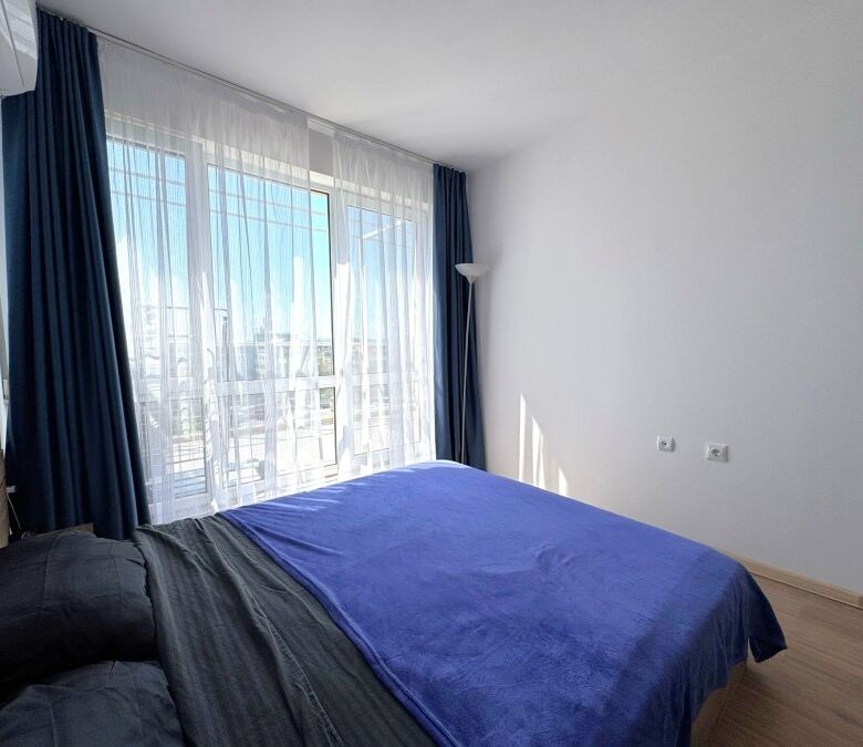 Bright bedroom with large windows and sea view in Flores Park, Sunny Beach.