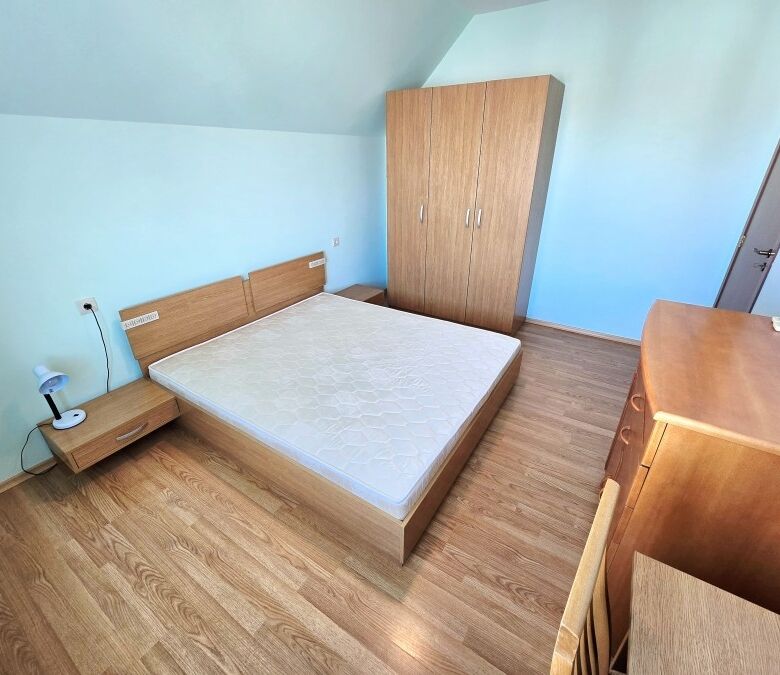 Bright bedroom with large bed and sea view terrace in Nessebar, Amoto.