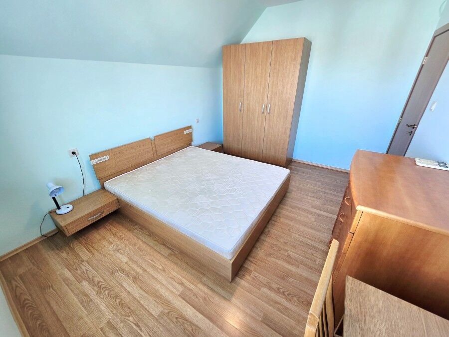 Bright bedroom with large bed and sea view terrace in Nessebar, Amoto.