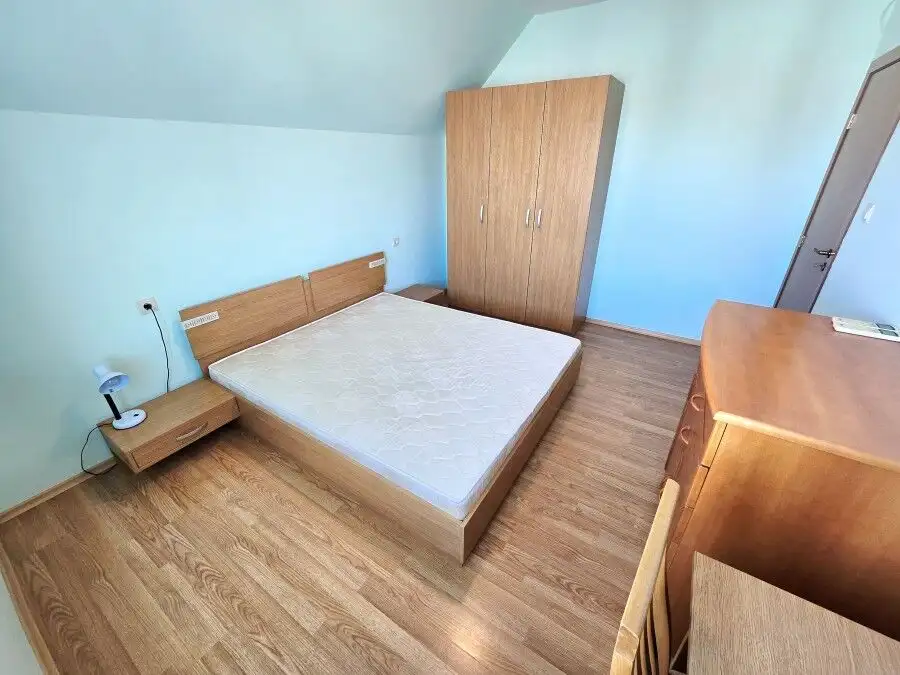 Bright bedroom with large bed and sea view terrace in Nessebar, Amoto.