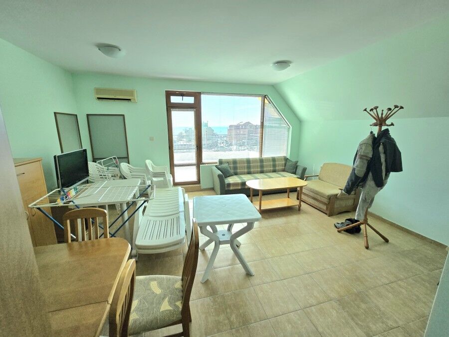 Bright 1-bedroom apartment with large terrace and sea views in Nessebar, Amoto. Spacious living area.