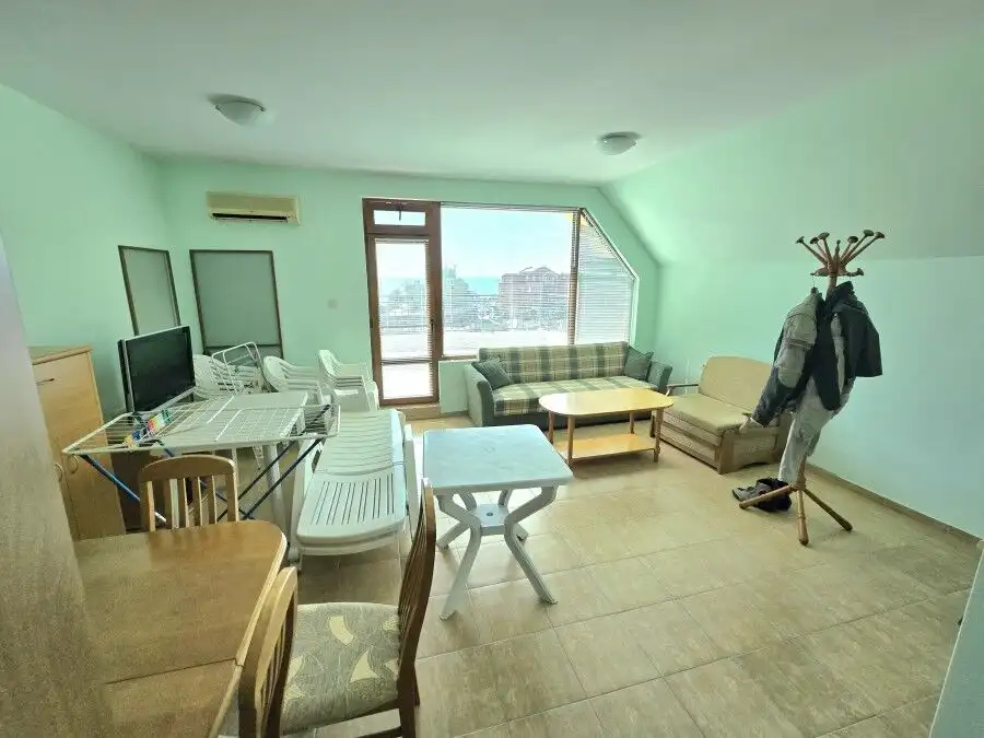 Bright 1-bedroom apartment with large terrace and sea views in Nessebar, Amoto. Spacious living area.
