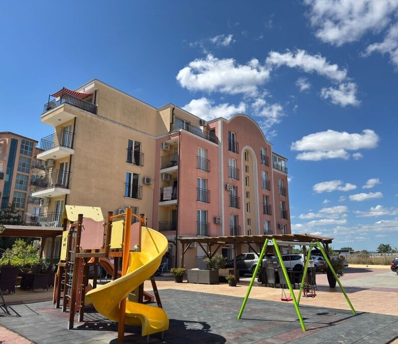 Contemporary residential complex close to Sunny Beach, featuring a playground and spacious balconies.