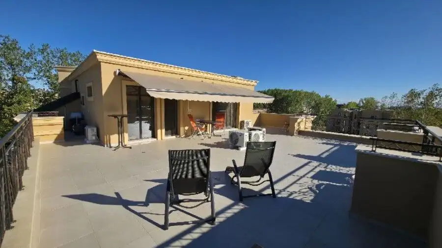Spacious terrace of luxury penthouse with seating area in Aphrodite Green, Sunny Beach.