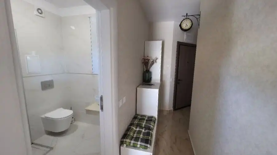 Bright interior of a luxury penthouse with a large terrace and scenic views in Aphrodite Green, Sunn.
