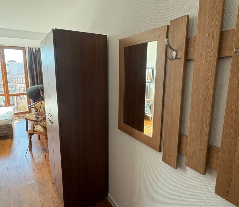 Modern studio interior with wardrobe and wall hooks in Panorama Bay 2, St. Vlas.