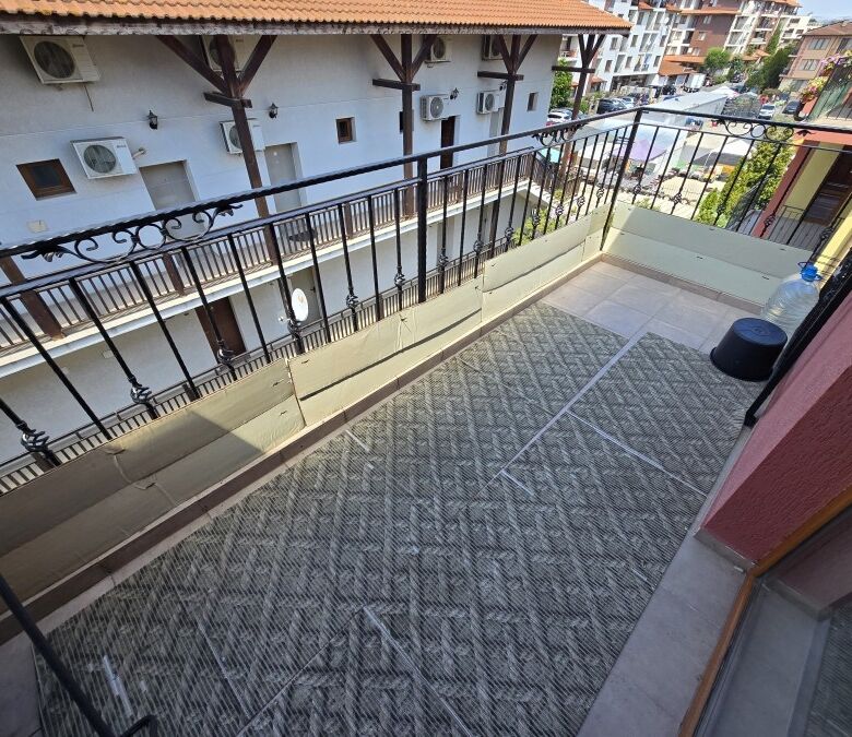 Balcony of a 1-bedroom apartment in Ravda, just 80m from the sea, with city views and outdoor space.
