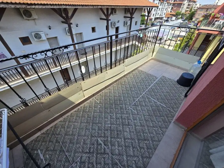Balcony of a 1-bedroom apartment in Ravda, just 80m from the sea, with city views and outdoor space.