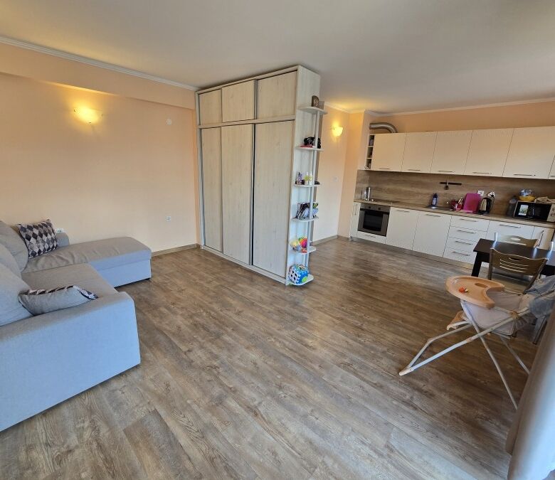 Interior view of a spacious 1-bedroom apartment in Ravda, close to the sea, with modern kitchen and.