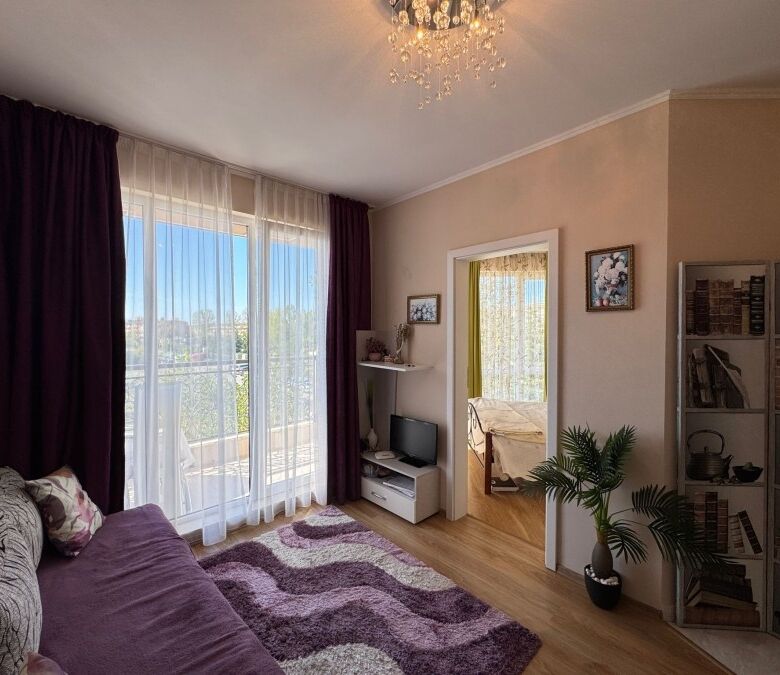 Interior view of a 1-bedroom apartment in Izida Palace Spa, Sunny Beach, with modern furnishings and.