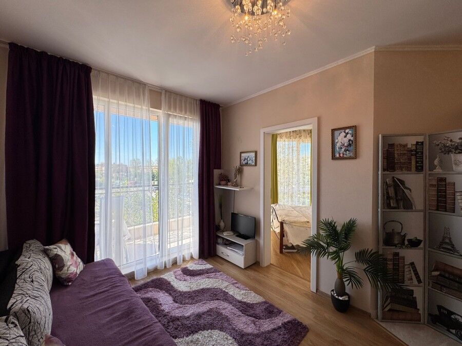 Interior view of a 1-bedroom apartment in Izida Palace Spa, Sunny Beach, with modern furnishings and.