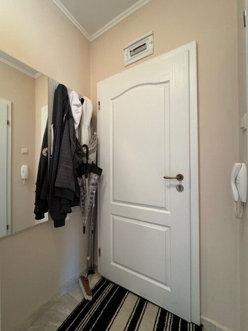 Entrance door to a 1-bedroom apartment in Izida Palace Spa, Sunny Beach.