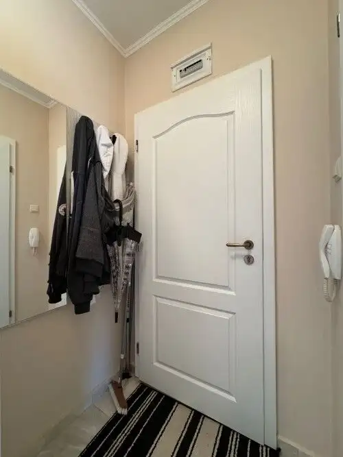 Entrance door to a 1-bedroom apartment in Izida Palace Spa, Sunny Beach.