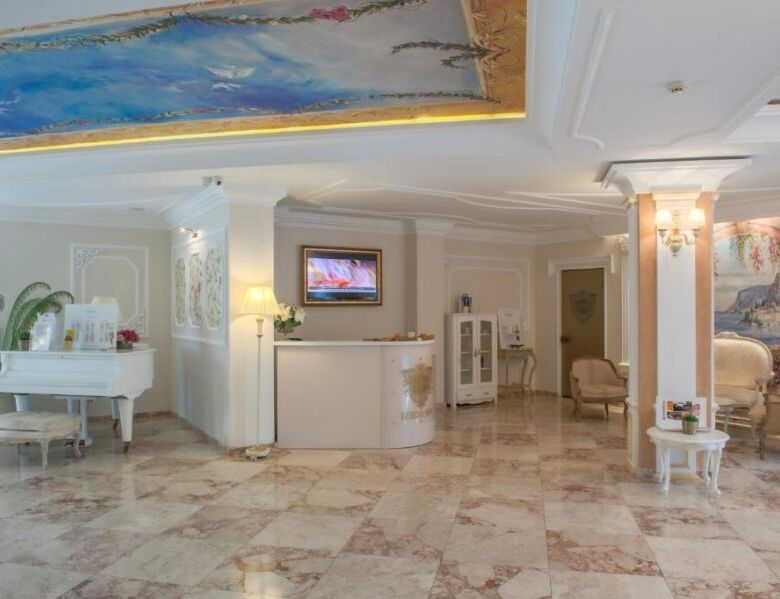 Luxurious hotel lobby with elegant decor, comfortable seating, and ambient lighting in a high-end re.