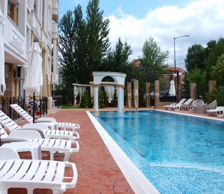 Modern poolside apartment in Sunny Beach with spacious terrace and scenic views.