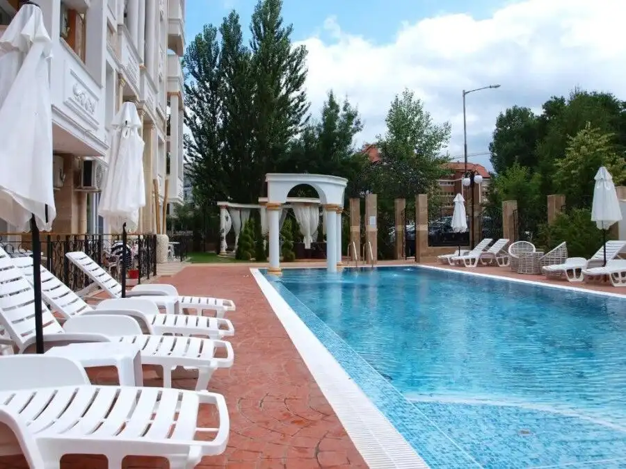 Modern poolside apartment in Sunny Beach with spacious terrace and scenic views.