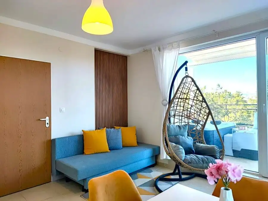 Apartment with terrace, Jacuzzi, and sea view near the beach in Pomorie Residence.