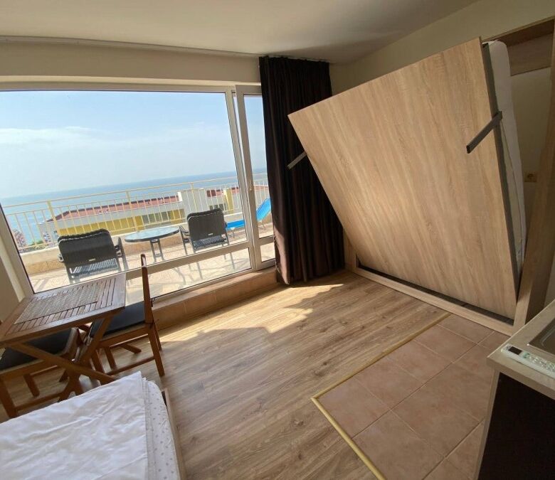 Bright studio apartment with stunning sea views and a large terrace, located just 200m from the beac.