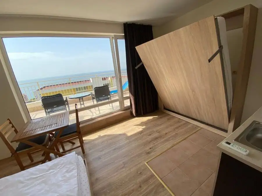 Bright studio apartment with stunning sea views and a large terrace, located just 200m from the beac.