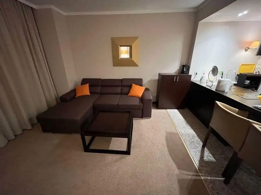 Cozy 1-bedroom apartment in Royal Beach Barcelo, Sunny Beach with living area and kitchen.