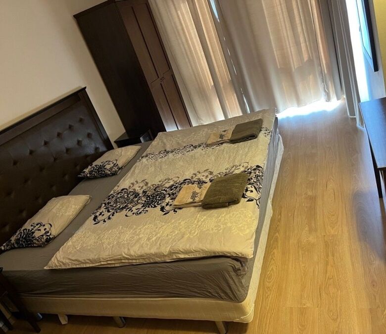 Spacious 1-bedroom apartment with modern furnishings and natural light.