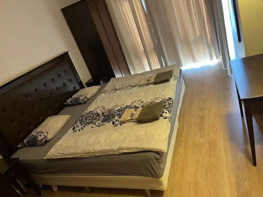 Spacious 1-bedroom apartment with modern furnishings and natural light.