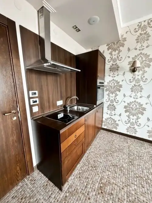 Modern kitchen in a 1-bedroom pool view apartment at Barcelo Royal Beach, Sunny Beach.