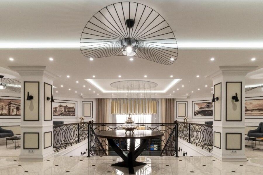 Elegant apartment interior with modern lighting and stylish decor.