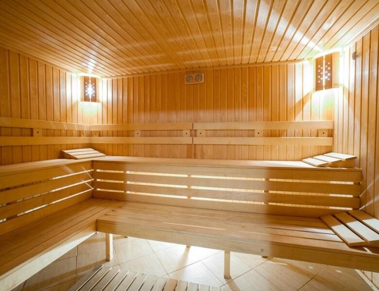 Sauna room with wooden benches in Dawn Park Deluxe spa complex, Sunny Beach.