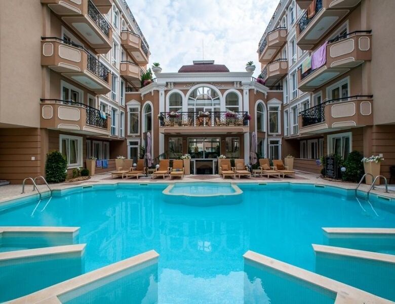 Luxury spa complex with a large swimming pool at Dawn Park Deluxe in Sunny Beach, Bulgaria, featurin.