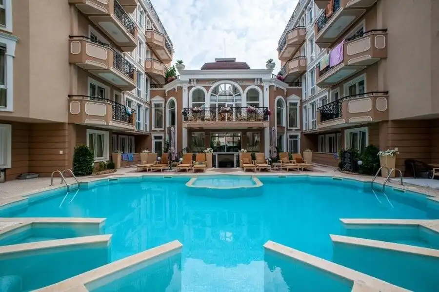 Luxury spa complex with a large swimming pool at Dawn Park Deluxe in Sunny Beach, Bulgaria, featurin.