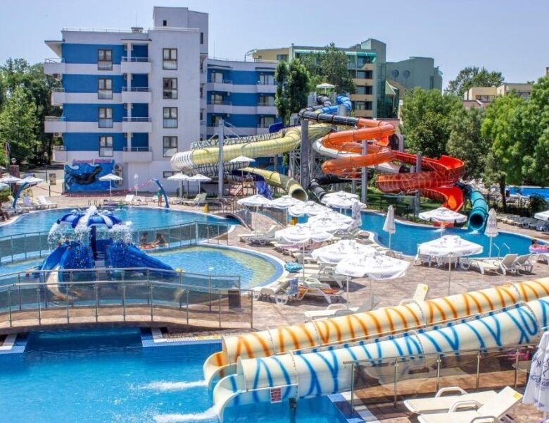 Bright water park featuring multiple slides, pools, and lounging areas in Sunny Beach. Perfect for f.