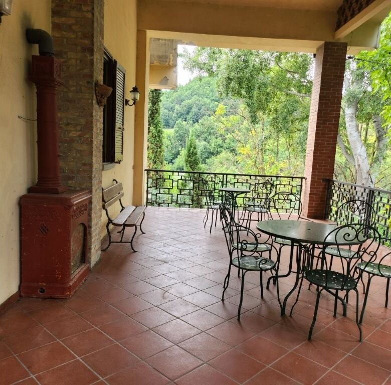 Elegant outdoor terrace with scenic views in Salsomaggiore Parma.