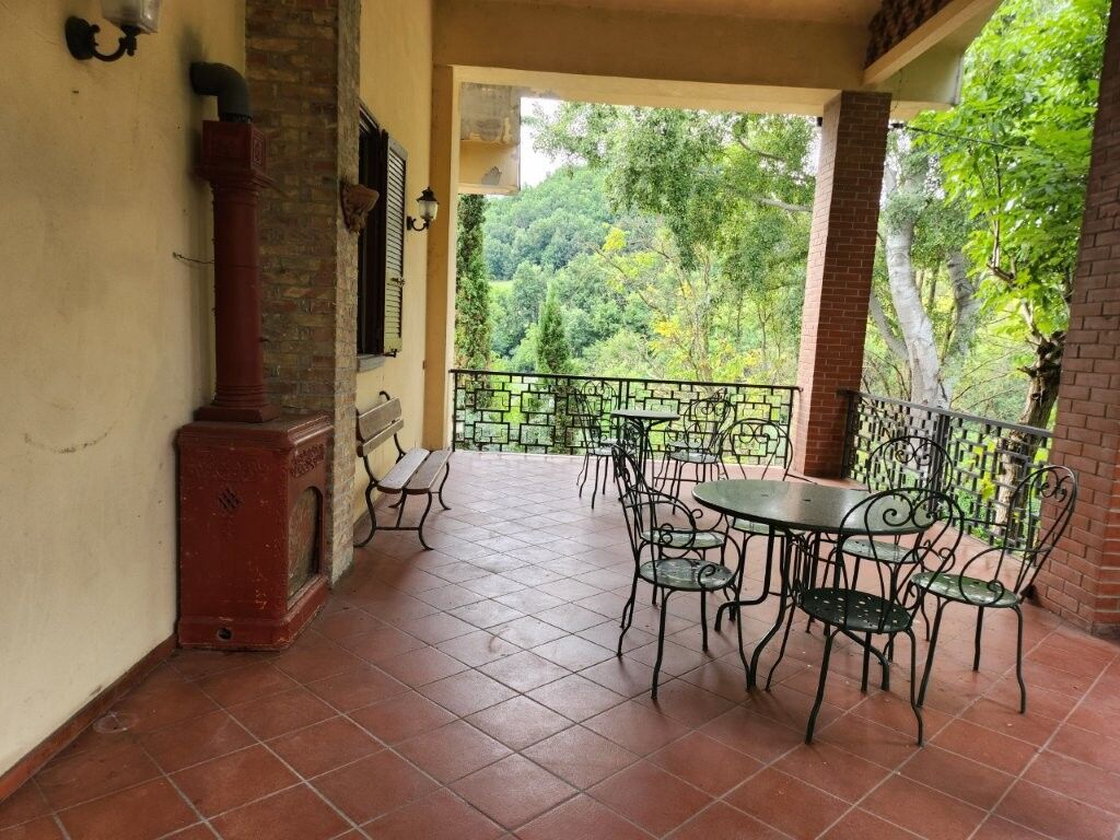 Luxury 5 Bed Country Villa for Sale In Salsomaggiore Parma Elegant outdoor terrace with scenic views in Salsomaggiore Parma.