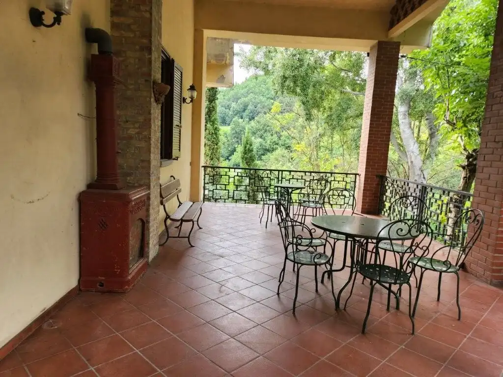Elegant outdoor terrace with scenic views in Salsomaggiore Parma.