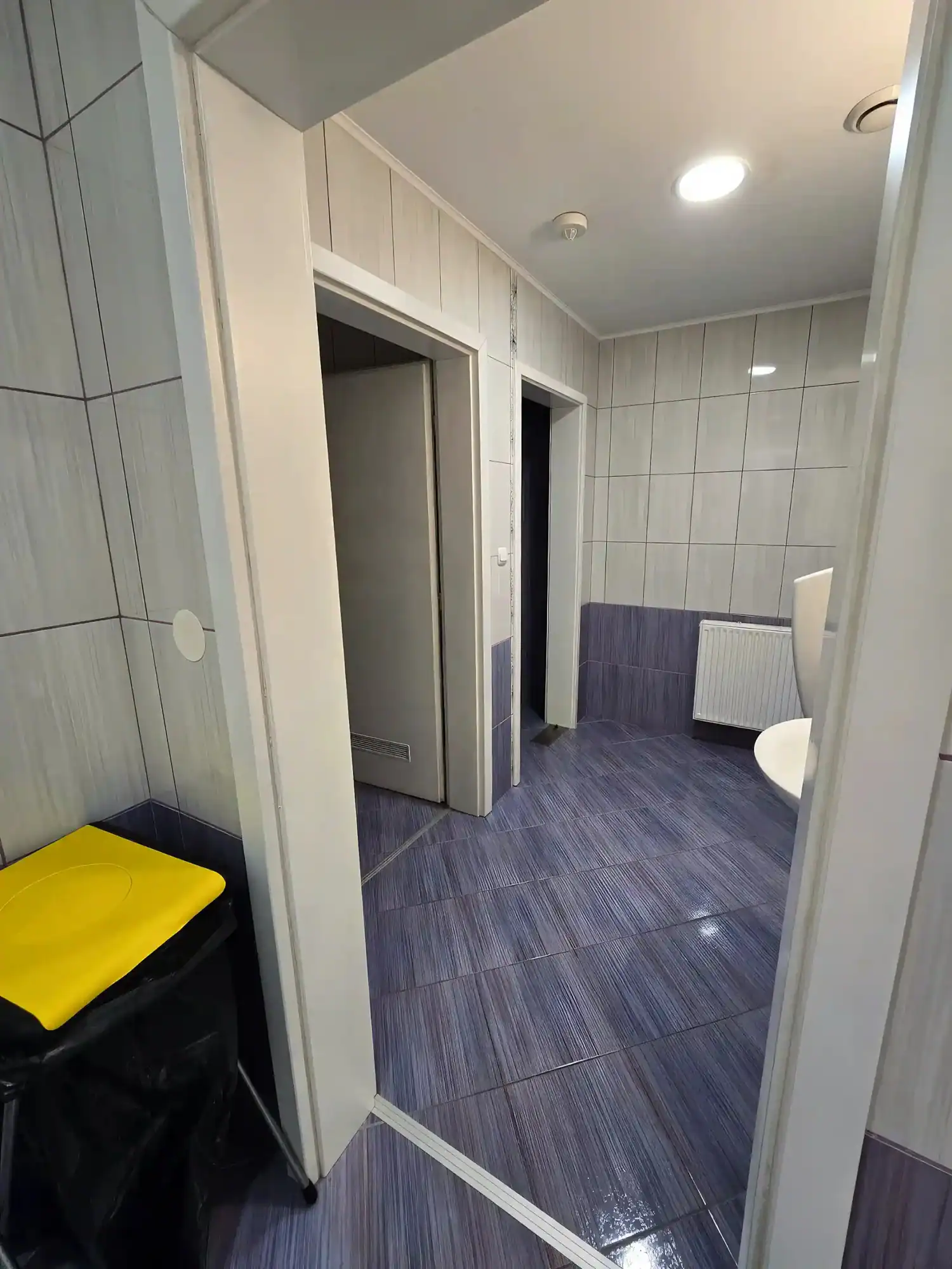 Commercial restroom with modern fixtures in Rogatec property listing.