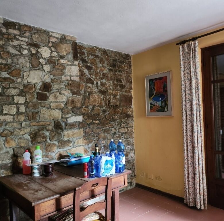 Elegant country villa with five bedrooms in Salsomaggiore Parma, featuring rustic stone walls and sp.