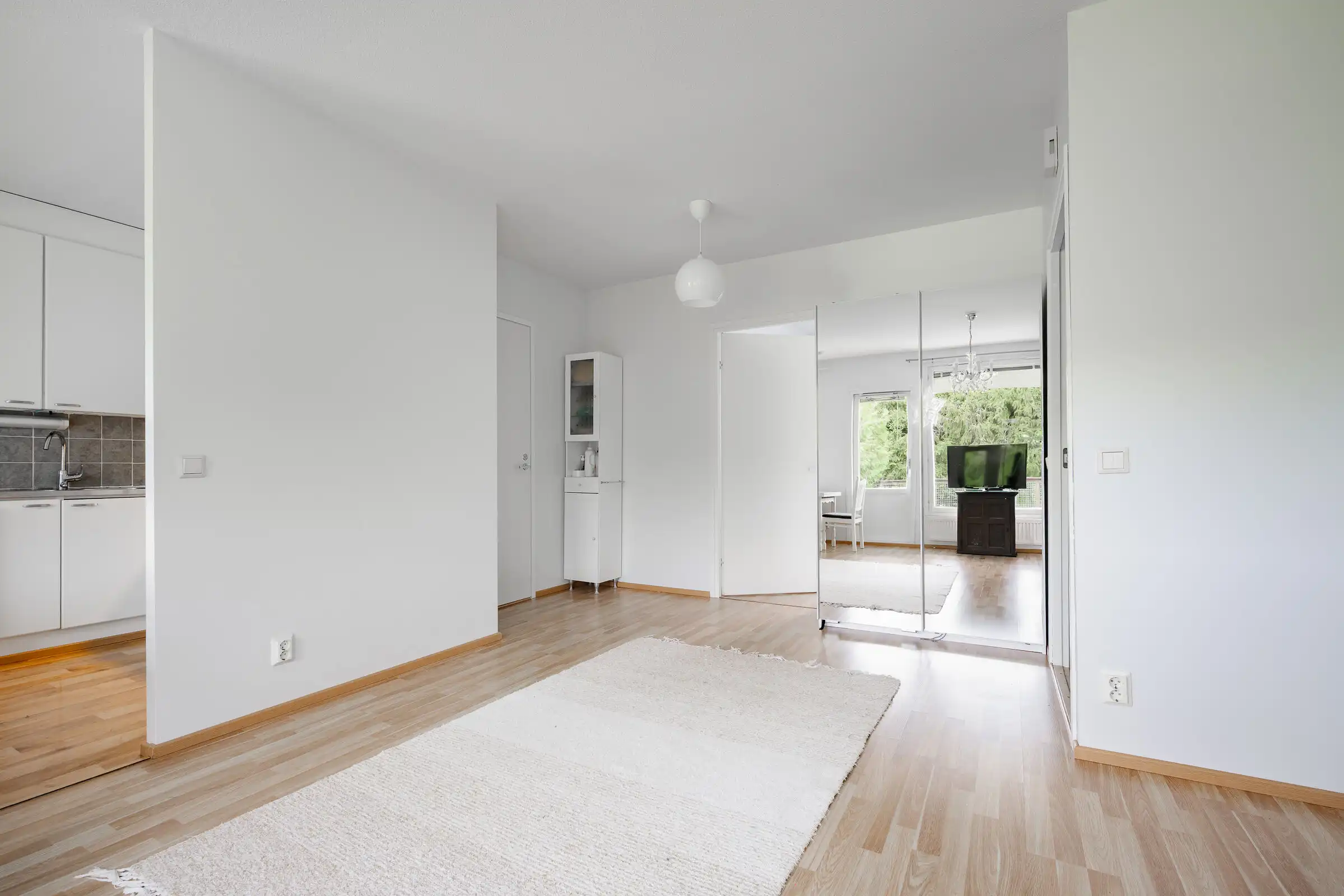 Bright, spacious living area in a beautiful 2-bedroom home in Hirvensalo, Turku, perfect for comfort.