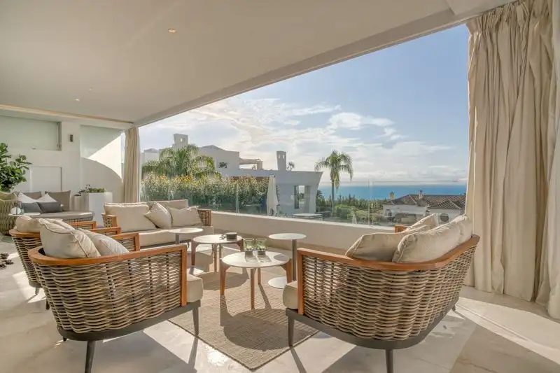 Ground floor luxury apartment overlooking the sea in Sierra Blanca. Spacious living area with modern.